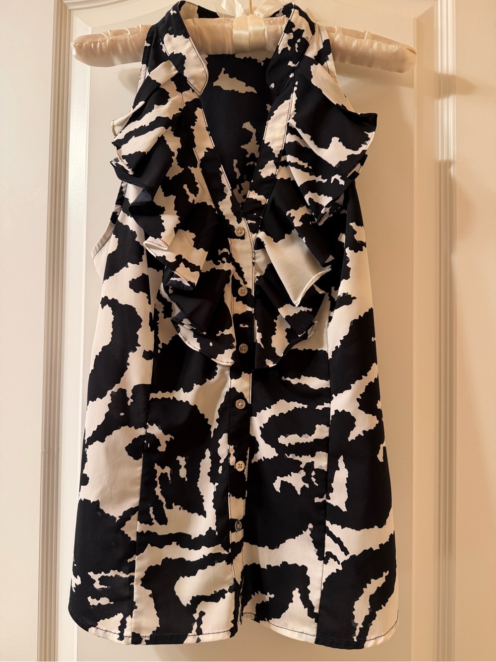 Express Black and White Printed Sleeveless Shirt With Ruffles & Side Zipper